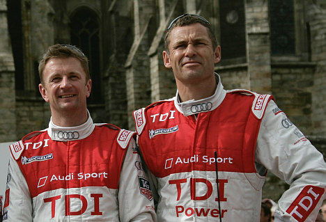 Allan McNish (tv) og Tom Kristensen er normalt team-kolleger i Audi Le Mans teamet, og de var sammen om at vinde 24-timers Le Mans i 2008. De er begge i København og skal dyste imod hinanden i Royal Pro-Am kategorien ved Copenhagen Historic Grand Prix i Fælledparken.